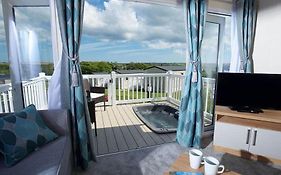 Our Goldfinch 1- Sleeps 2 Persons- Private Hot Tub-Pet Friendly-Tranquil Holiday Away From It All Yet Not Far From St Austell- The Holiday Home Has One Bedroom, Living And Dining Area, Equipped Kitchen-Decking-Outdoor Furniture-Fishing Lakes And More
